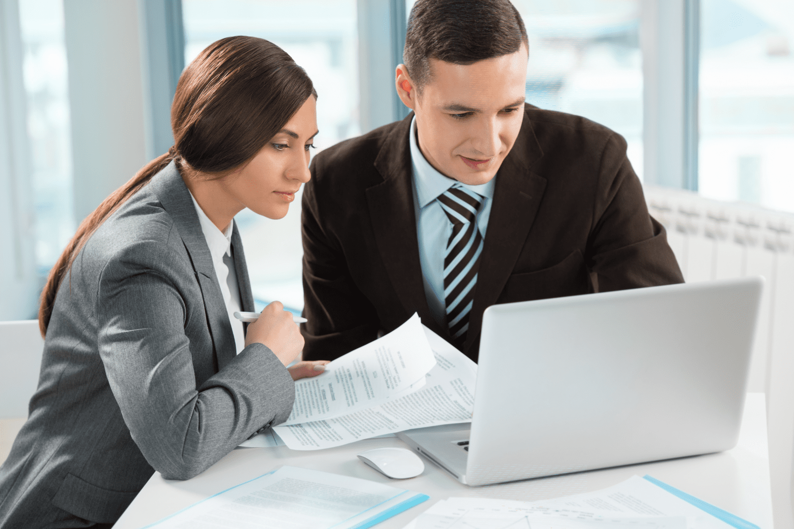 Accountancy Recruitment - Woman and man looking at a laptop.