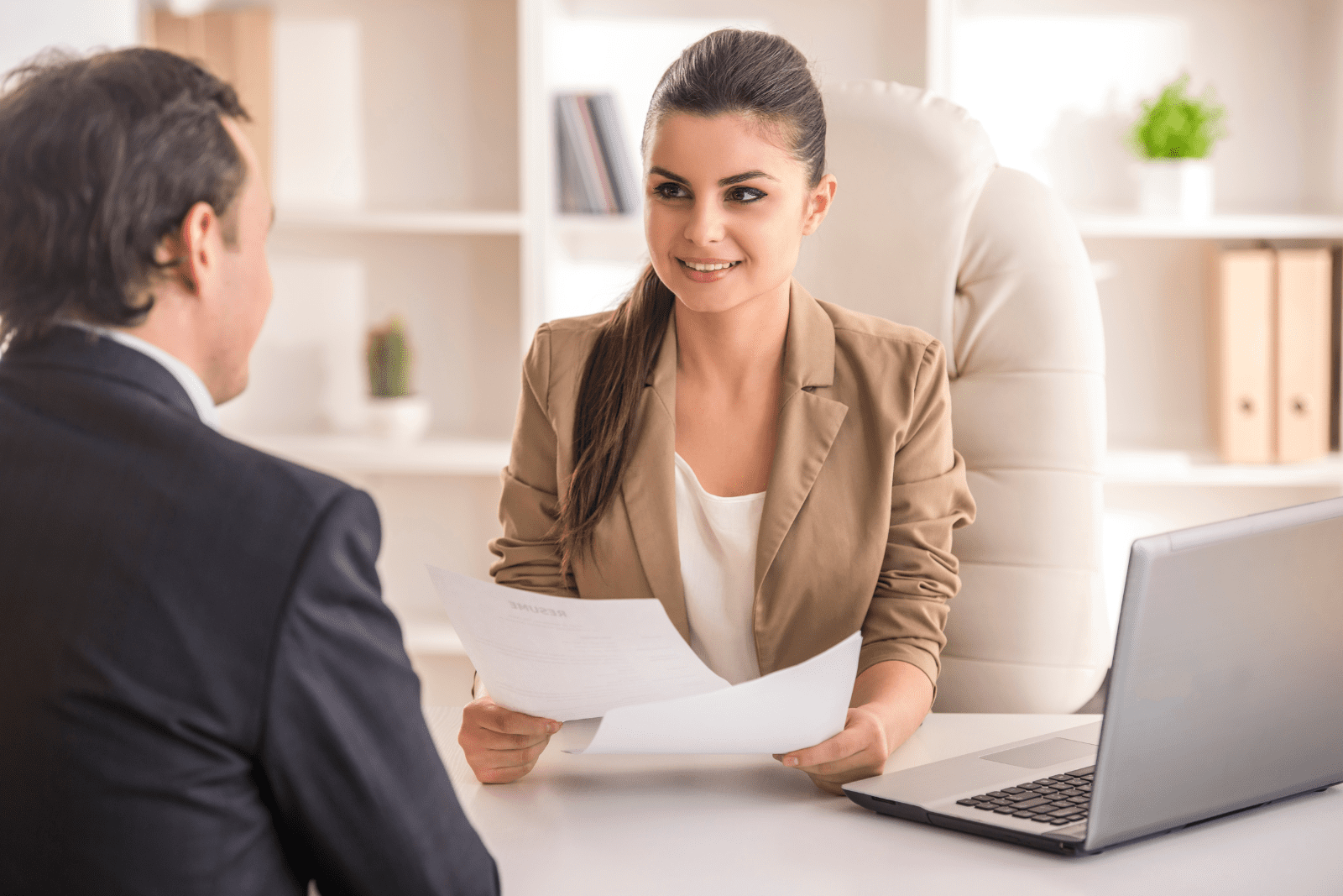 Female interviewing a male for the job.