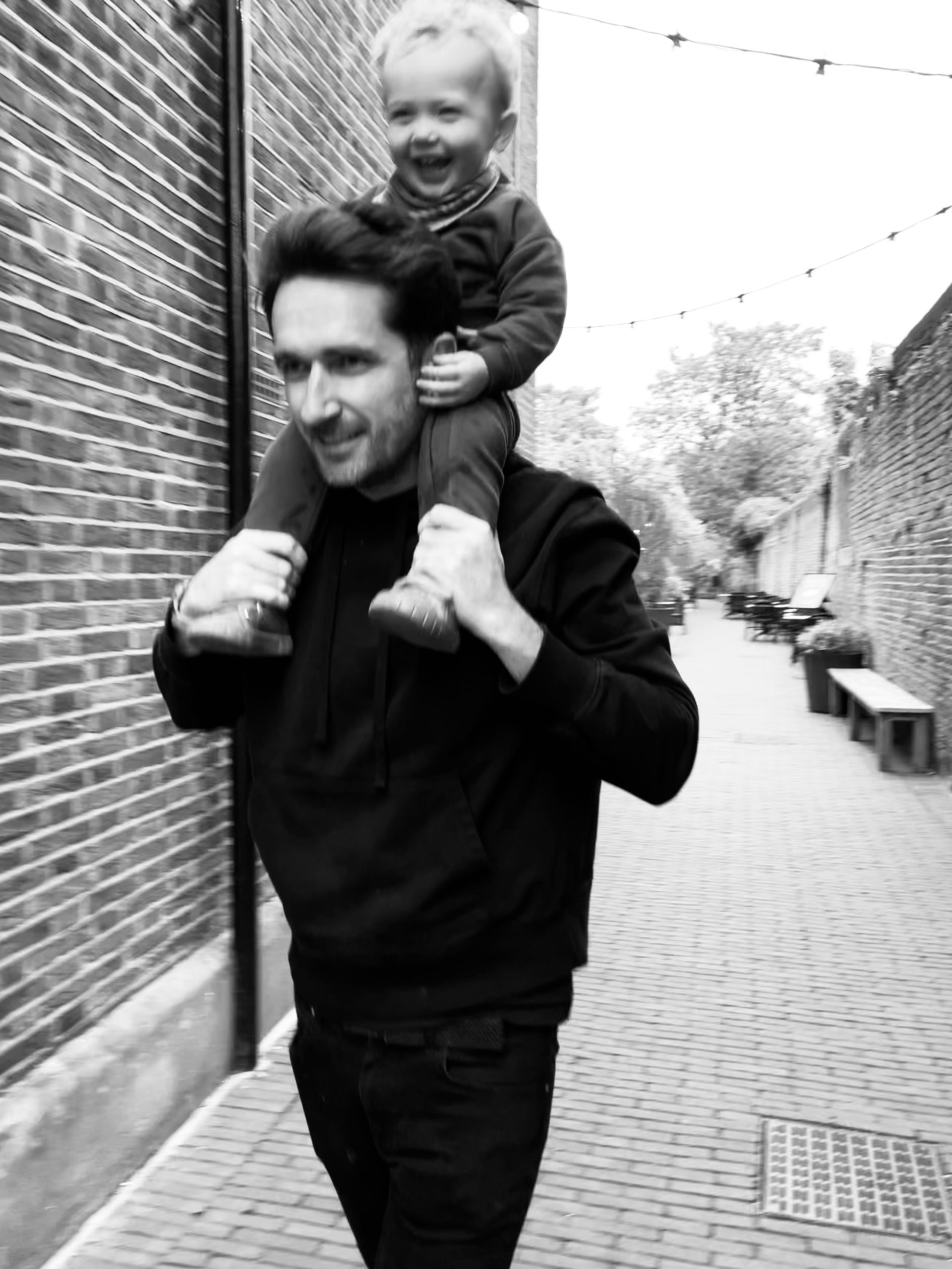 Image of 30SIX founder James with his son on his shoulders