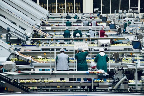 a group of people in a factory