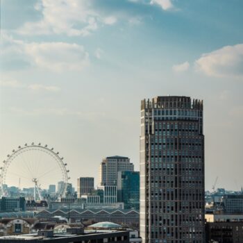 a city with a ferris wheel