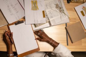 Fashion Designer Sketching Design