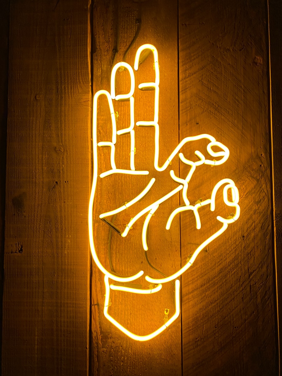 Neon hand sign