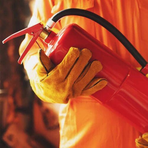 fireman holding a fire extinguisher