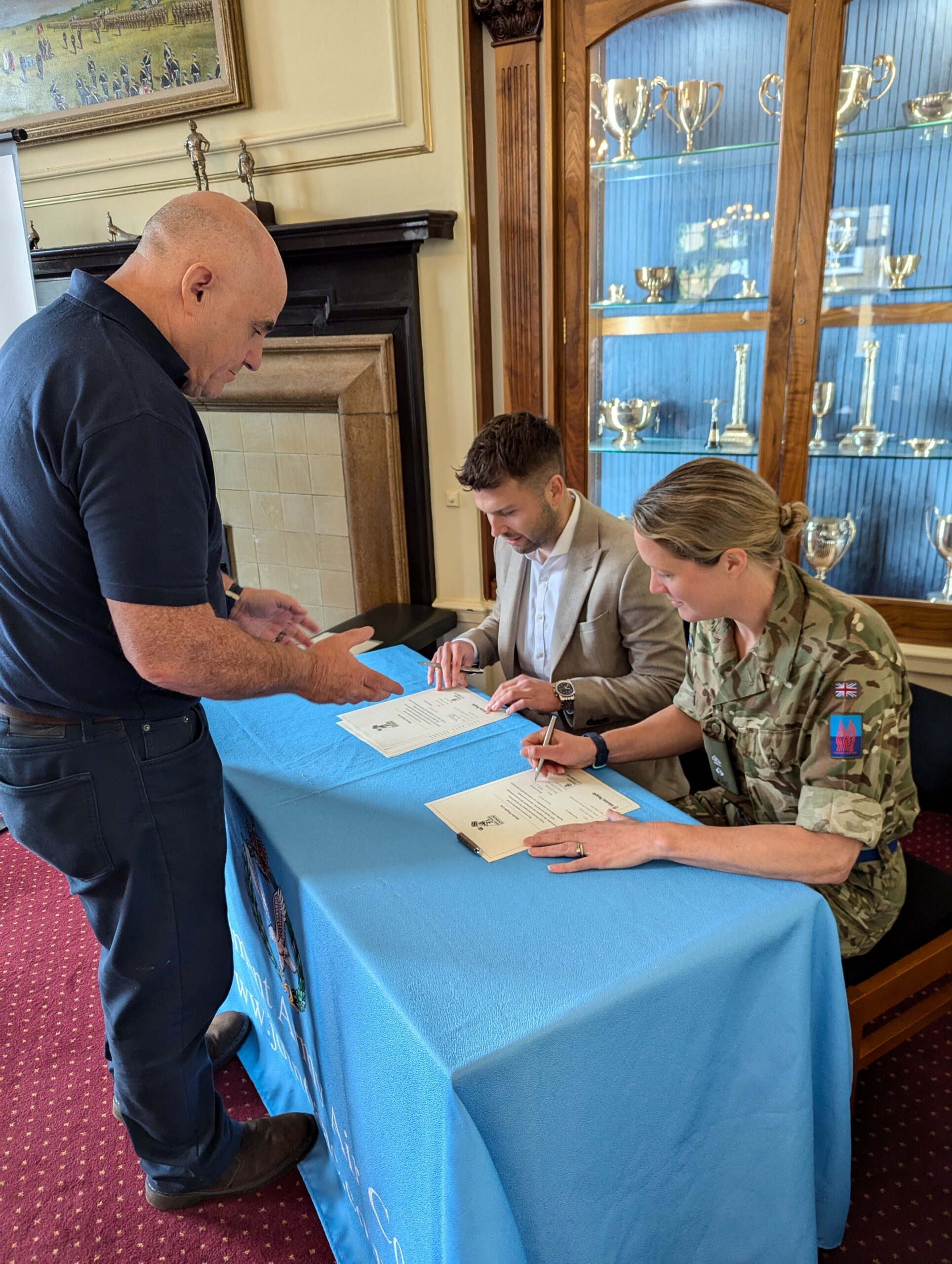 Marine People Founder and Director signing the Armed Forces Covenant