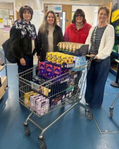 Rebecca Bowring-Kingman and Durlston Parents' Association dropping Easter Eggs to New Forest Basics Food Bank Volunteers - rebecca bowring-kingman